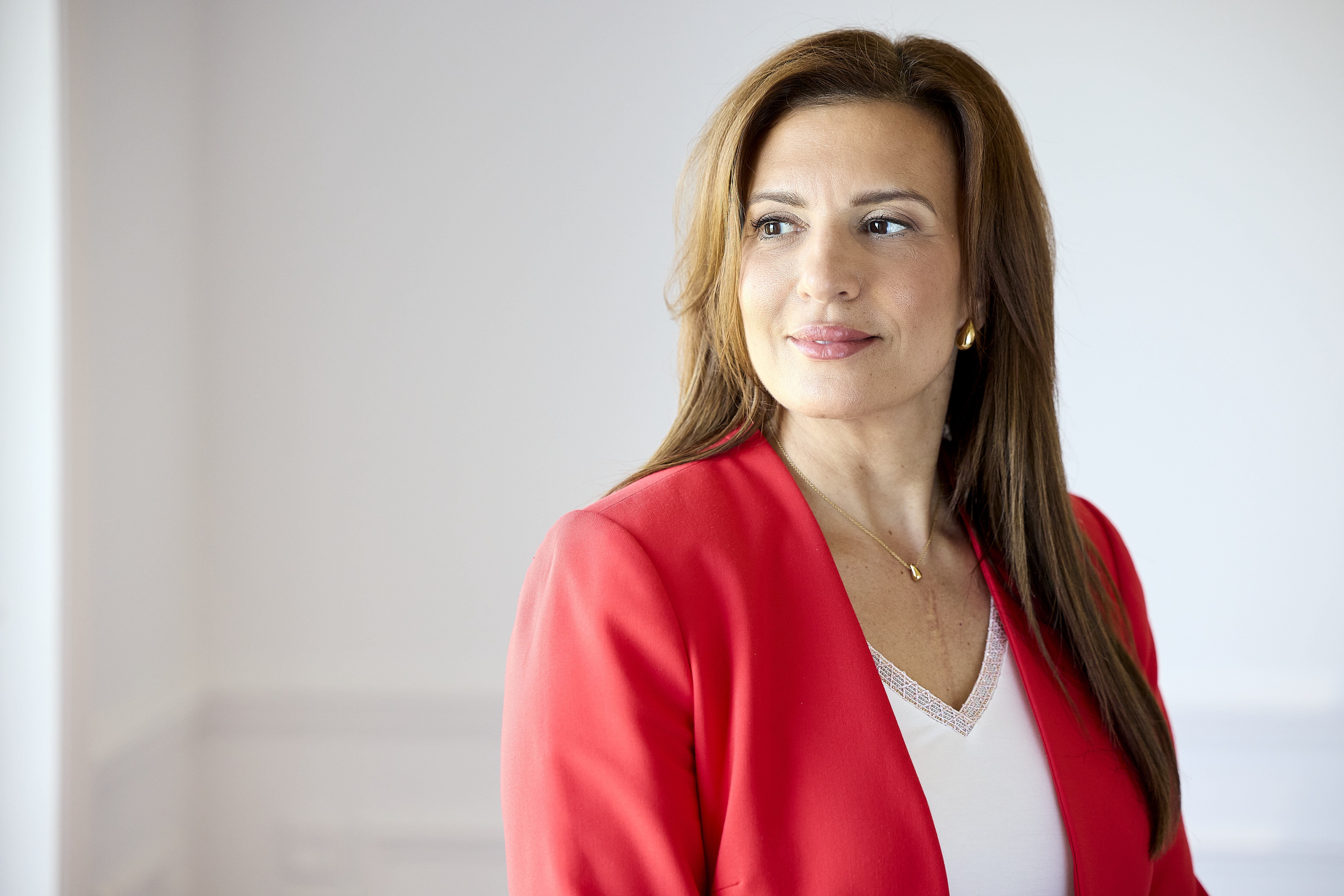 Marie-Dominique Taillon — portrait in a red blazer