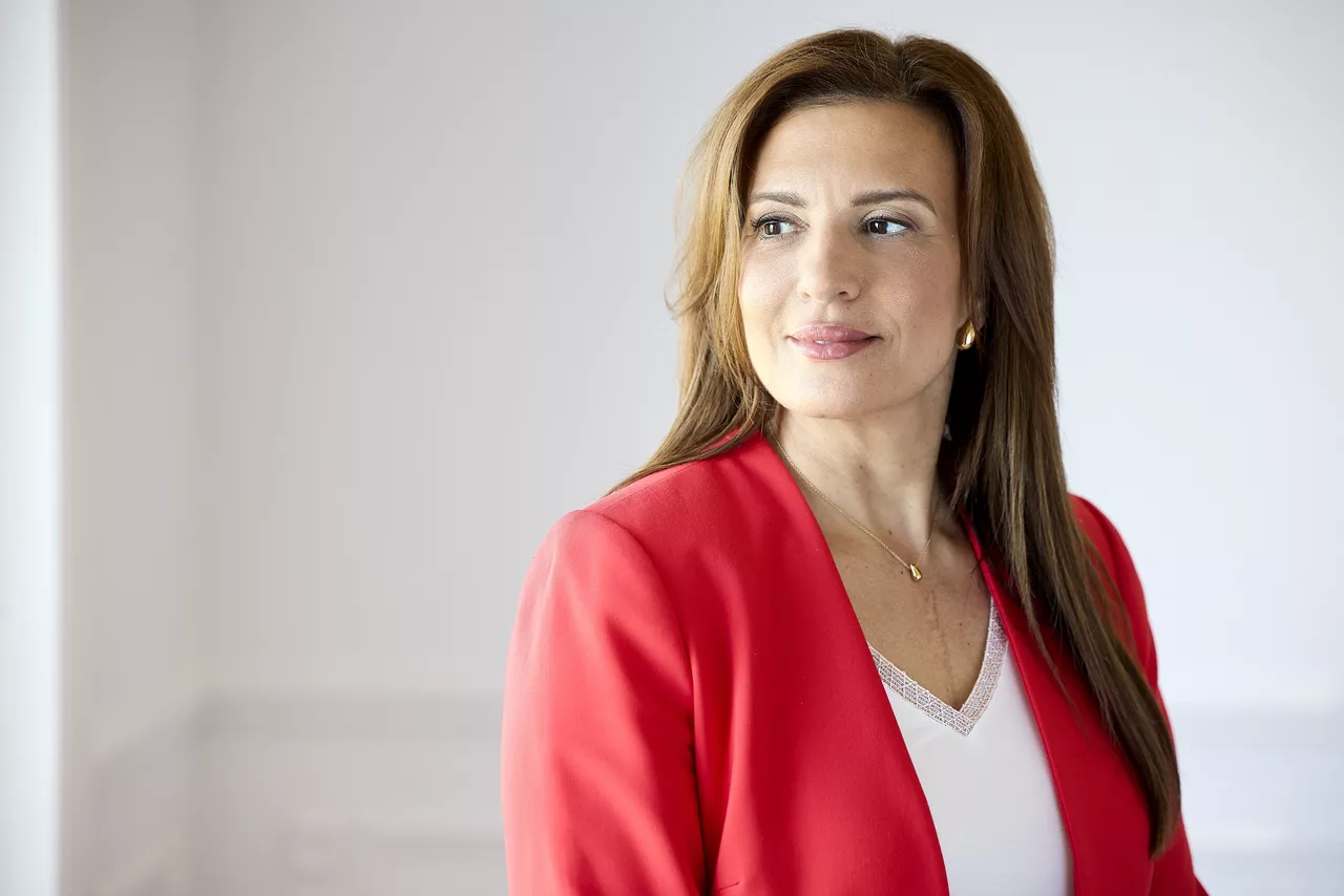 Marie-Dominique Taillon — portrait in a red blazer